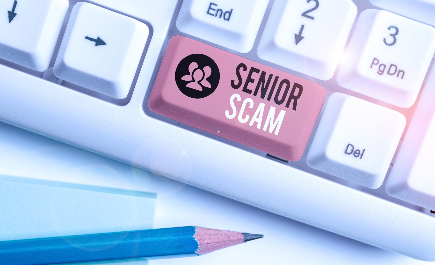keyboard with button saying senior scam